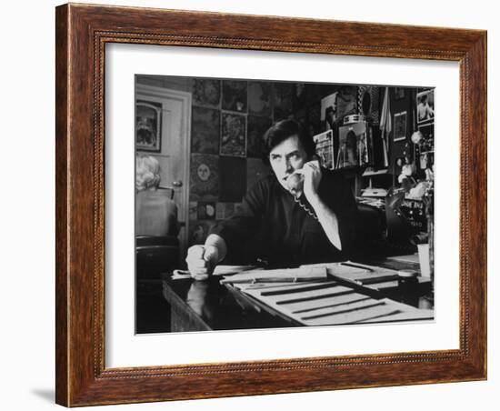 Bill Graham, Owner of Filmores East and West, Talking on Phone as He Works in His Office-John Olson-Framed Photographic Print