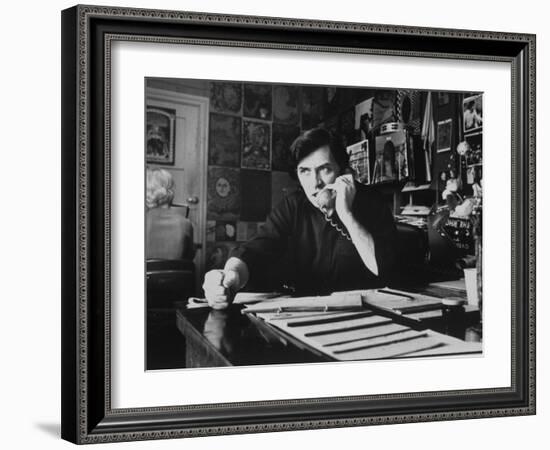 Bill Graham, Owner of Filmores East and West, Talking on Phone as He Works in His Office-John Olson-Framed Photographic Print