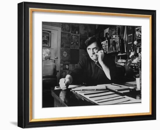 Bill Graham, Owner of Filmores East and West, Talking on Phone as He Works in His Office-John Olson-Framed Photographic Print