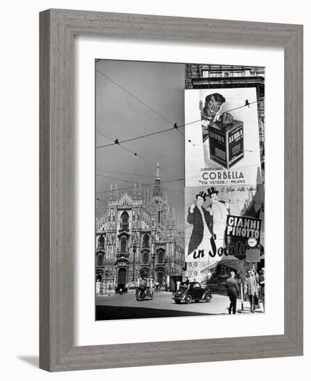 Billboard in the Piazza Del Duomo features Abbott and Costello, Whom Italians Call Cianni E Pinotto-Alfred Eisenstaedt-Framed Photographic Print