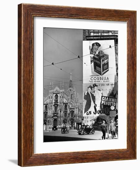 Billboard in the Piazza Del Duomo features Abbott and Costello, Whom Italians Call Cianni E Pinotto-Alfred Eisenstaedt-Framed Photographic Print