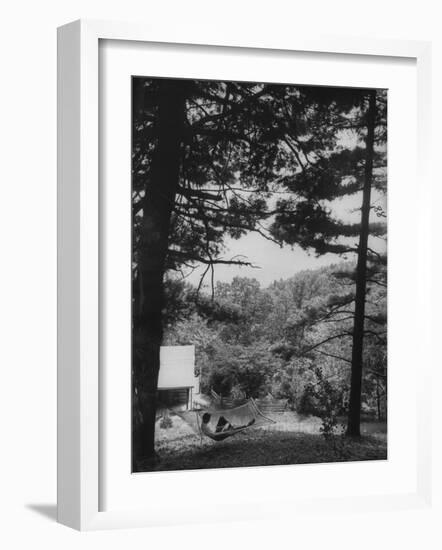 Billy Graham Reading the Bible Outside the Cabin Where He Seeks Seclusion-Ed Clark-Framed Photographic Print