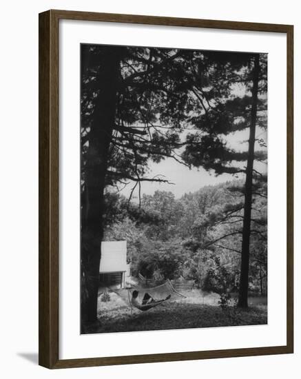 Billy Graham Reading the Bible Outside the Cabin Where He Seeks Seclusion-Ed Clark-Framed Photographic Print