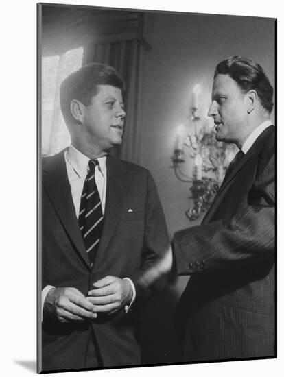 Billy Graham Speaking with President John F. Kennedy at a Prayer Breakfast-null-Mounted Photographic Print