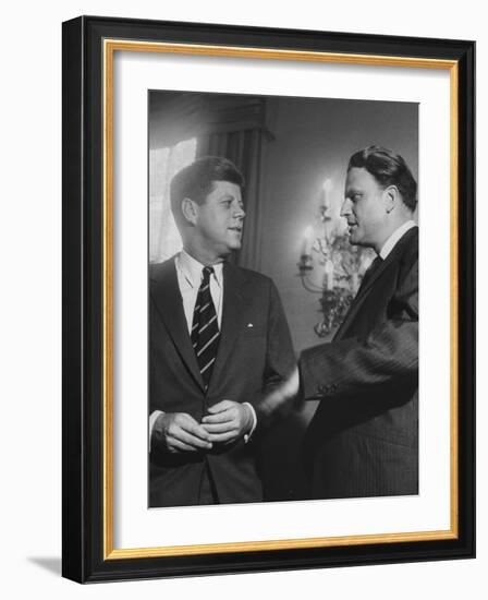 Billy Graham Speaking with President John F. Kennedy at a Prayer Breakfast-null-Framed Photographic Print