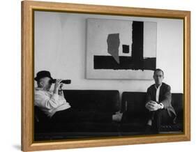 Billy Wilder in His Hollywood Office, Looking Through Binoculars-Gjon Mili-Framed Premier Image Canvas