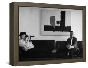 Billy Wilder in His Hollywood Office, Looking Through Binoculars-Gjon Mili-Framed Premier Image Canvas