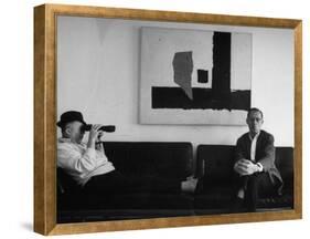 Billy Wilder in His Hollywood Office, Looking Through Binoculars-Gjon Mili-Framed Premier Image Canvas