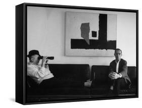 Billy Wilder in His Hollywood Office, Looking Through Binoculars-Gjon Mili-Framed Premier Image Canvas