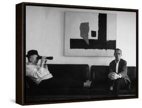 Billy Wilder in His Hollywood Office, Looking Through Binoculars-Gjon Mili-Framed Premier Image Canvas