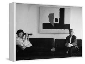 Billy Wilder in His Hollywood Office, Looking Through Binoculars-Gjon Mili-Framed Premier Image Canvas