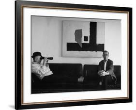 Billy Wilder in His Hollywood Office, Looking Through Binoculars-Gjon Mili-Framed Premium Photographic Print