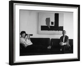Billy Wilder in His Hollywood Office, Looking Through Binoculars-Gjon Mili-Framed Premium Photographic Print