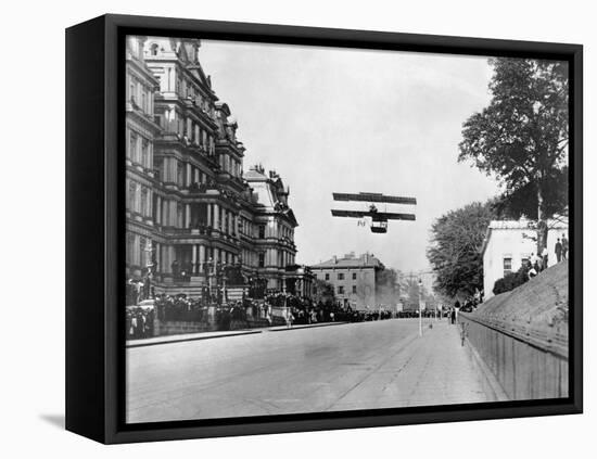 Biplane Flying over Washington-null-Framed Premier Image Canvas