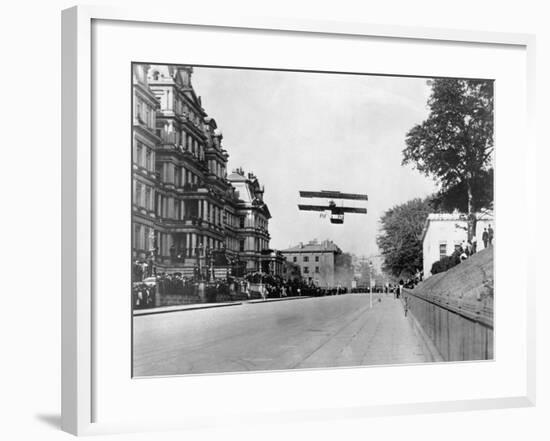 Biplane Flying over Washington-null-Framed Photographic Print