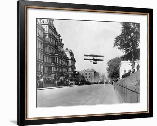 Biplane Flying over Washington-null-Framed Photographic Print