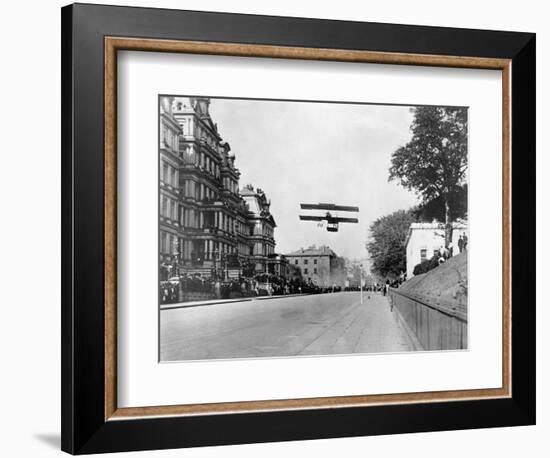 Biplane Flying over Washington-null-Framed Photographic Print