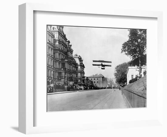 Biplane Flying over Washington-null-Framed Photographic Print