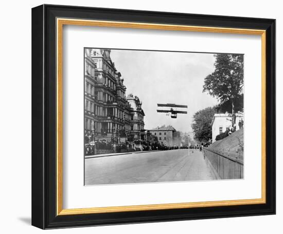 Biplane Flying over Washington-null-Framed Photographic Print