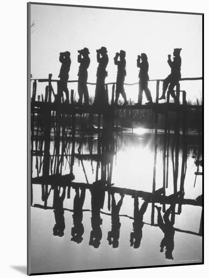 Bird Counters of the Audubon Society Standing on a Bridge-Francis Miller-Mounted Photographic Print