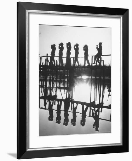 Bird Counters of the Audubon Society Standing on a Bridge-Francis Miller-Framed Photographic Print