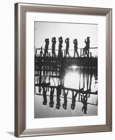 Bird Counters of the Audubon Society Standing on a Bridge-Francis Miller-Framed Photographic Print