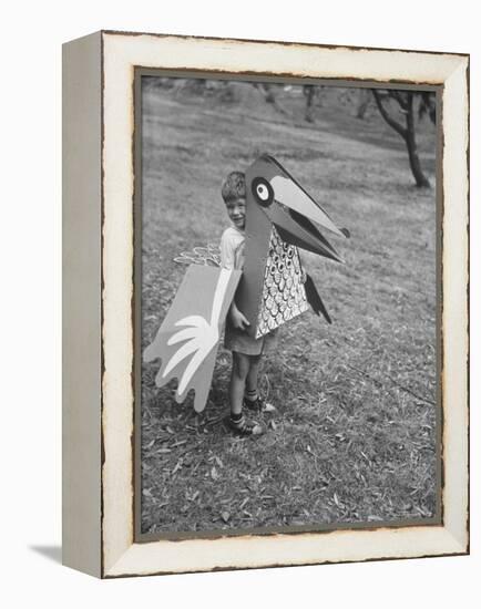 Bird Toy Made to Wear For Children by Charles Eames-Allan Grant-Framed Premier Image Canvas