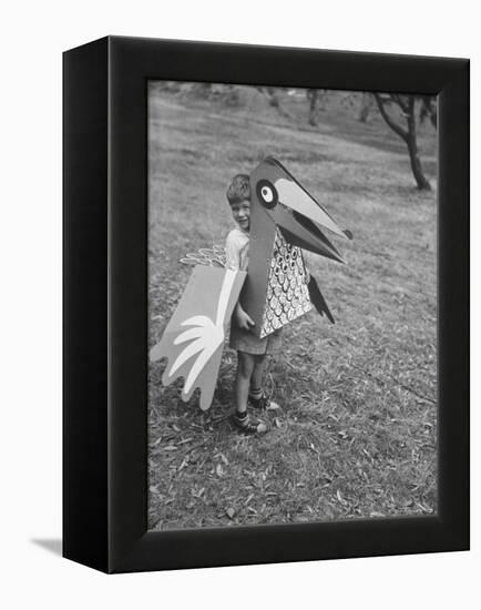 Bird Toy Made to Wear For Children by Charles Eames-Allan Grant-Framed Premier Image Canvas