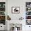 Black-And-White Border Collie Lying Chin on Floor with Black-And-White Kitten-Jane Burton-Framed Photographic Print displayed on a wall