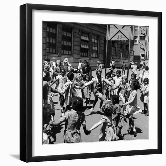 Black and White Children Playing in School Playground-Peter Stackpole-Framed Photographic Print