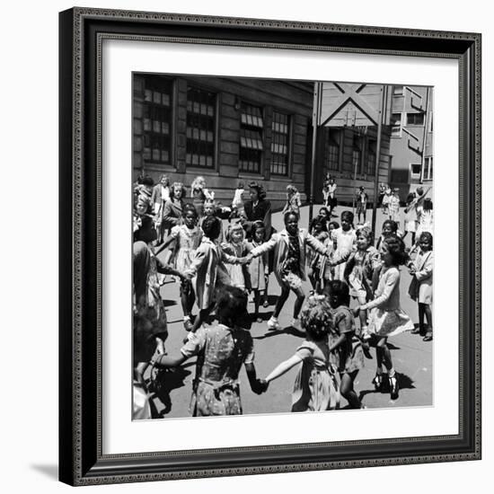 Black and White Children Playing in School Playground-Peter Stackpole-Framed Photographic Print