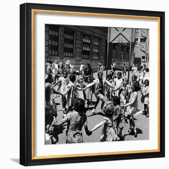 Black and White Children Playing in School Playground-Peter Stackpole-Framed Photographic Print