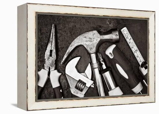 Black and White Image of a Set of Tools on a Textured Metallic Background-Kamira-Framed Premier Image Canvas