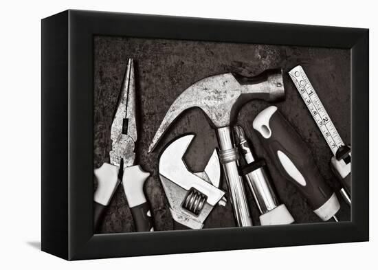 Black and White Image of a Set of Tools on a Textured Metallic Background-Kamira-Framed Premier Image Canvas