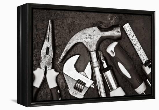 Black and White Image of a Set of Tools on a Textured Metallic Background-Kamira-Framed Premier Image Canvas