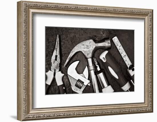 Black and White Image of a Set of Tools on a Textured Metallic Background-Kamira-Framed Photographic Print