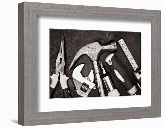 Black and White Image of a Set of Tools on a Textured Metallic Background-Kamira-Framed Photographic Print