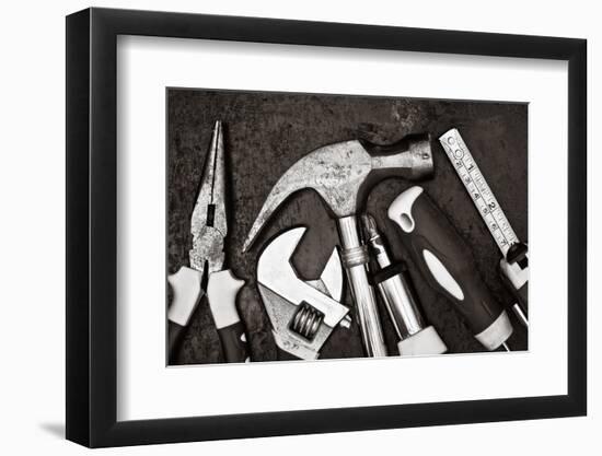 Black and White Image of a Set of Tools on a Textured Metallic Background-Kamira-Framed Photographic Print