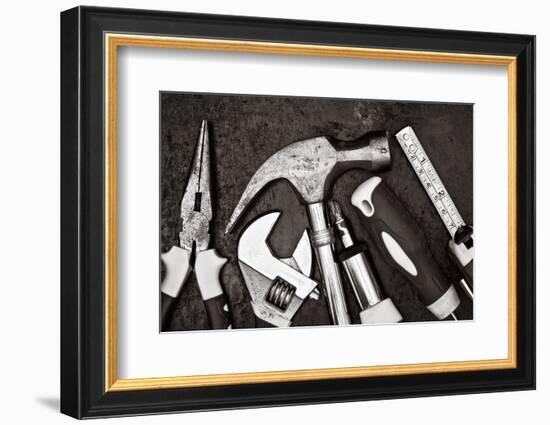 Black and White Image of a Set of Tools on a Textured Metallic Background-Kamira-Framed Photographic Print