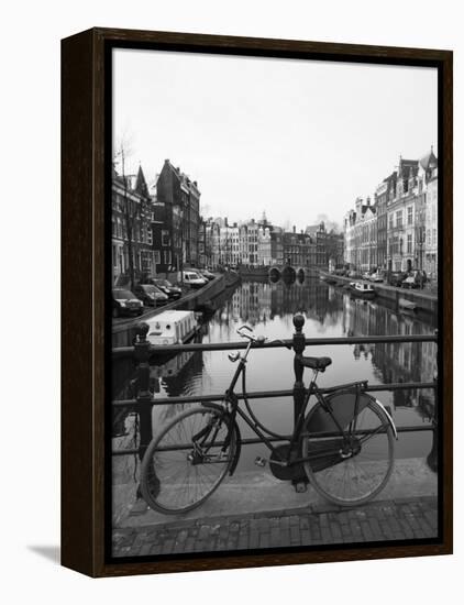 Black and White Image of an Old Bicycle by the Singel Canal, Amsterdam, Netherlands, Europe-Amanda Hall-Framed Premier Image Canvas