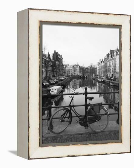 Black and White Image of an Old Bicycle by the Singel Canal, Amsterdam, Netherlands, Europe-Amanda Hall-Framed Premier Image Canvas