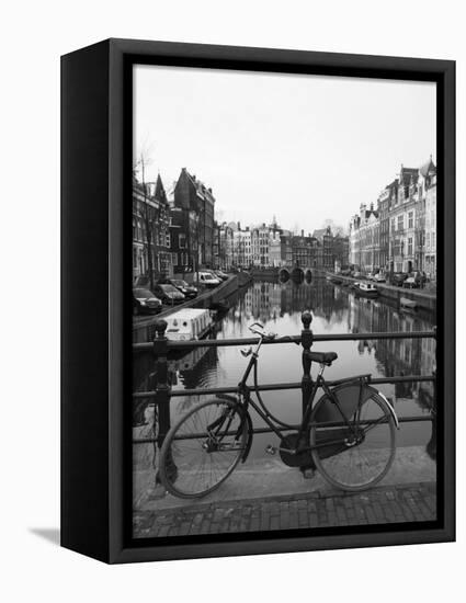 Black and White Image of an Old Bicycle by the Singel Canal, Amsterdam, Netherlands, Europe-Amanda Hall-Framed Premier Image Canvas