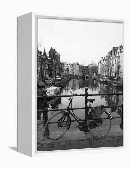 Black and White Image of an Old Bicycle by the Singel Canal, Amsterdam, Netherlands, Europe-Amanda Hall-Framed Premier Image Canvas