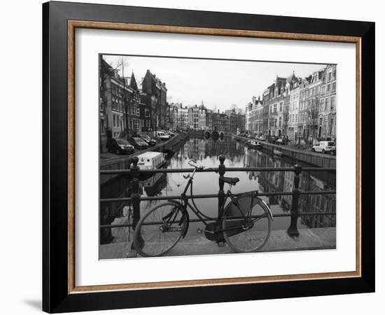 Black and White Imge of an Old Bicycle by the Singel Canal, Amsterdam, Netherlands, Europe-Amanda Hall-Framed Photographic Print