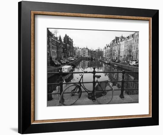 Black and White Imge of an Old Bicycle by the Singel Canal, Amsterdam, Netherlands, Europe-Amanda Hall-Framed Photographic Print