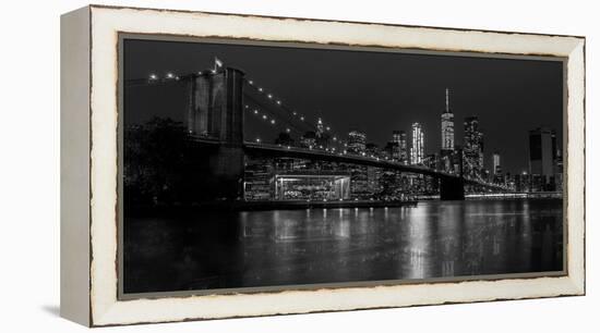 Black and white Manhattan skyline from Brooklyn Bridge park with reflection in the East River-David Chang-Framed Premier Image Canvas