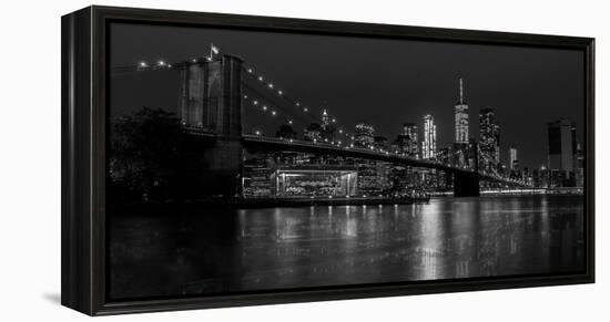Black and white Manhattan skyline from Brooklyn Bridge park with reflection in the East River-David Chang-Framed Premier Image Canvas