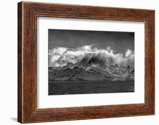 Black and white of South Georgia Island. Opening in clouds and Virga reveal the landscape.-Howie Garber-Framed Photographic Print