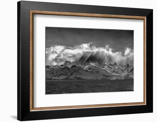 Black and white of South Georgia Island. Opening in clouds and Virga reveal the landscape.-Howie Garber-Framed Photographic Print