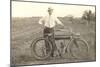 Black and White Photo of Man with Vintage Motorcycle-null-Mounted Art Print